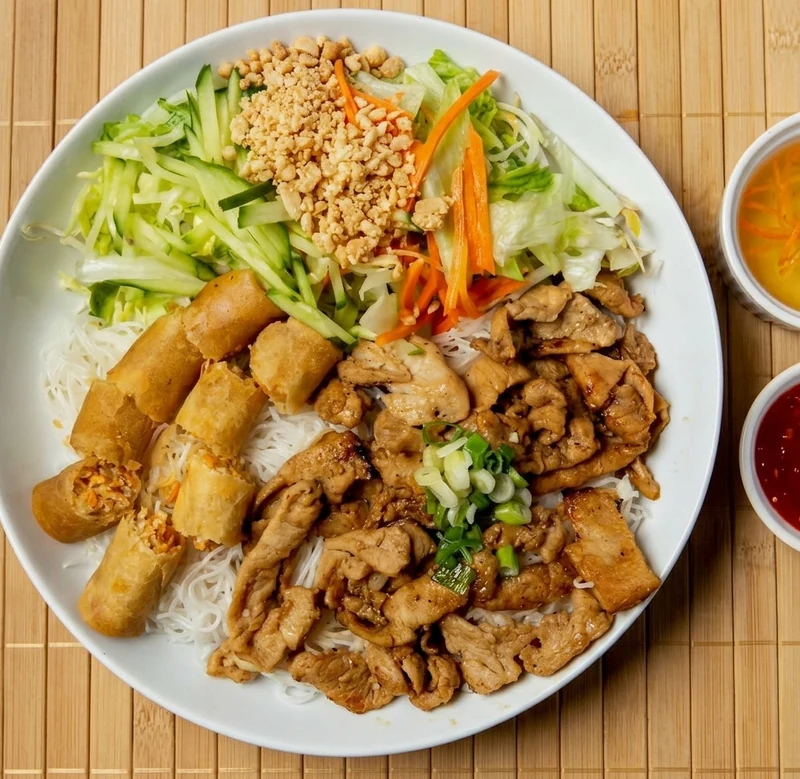 Vermicelli with grilled ground pork and spring rolls in downtown Calgary