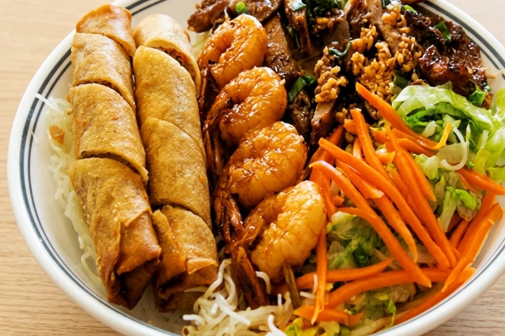 Lemongrass beef vermicelli with spring rolls and charbroiled shrimp at Ha Long Bay, Calgary